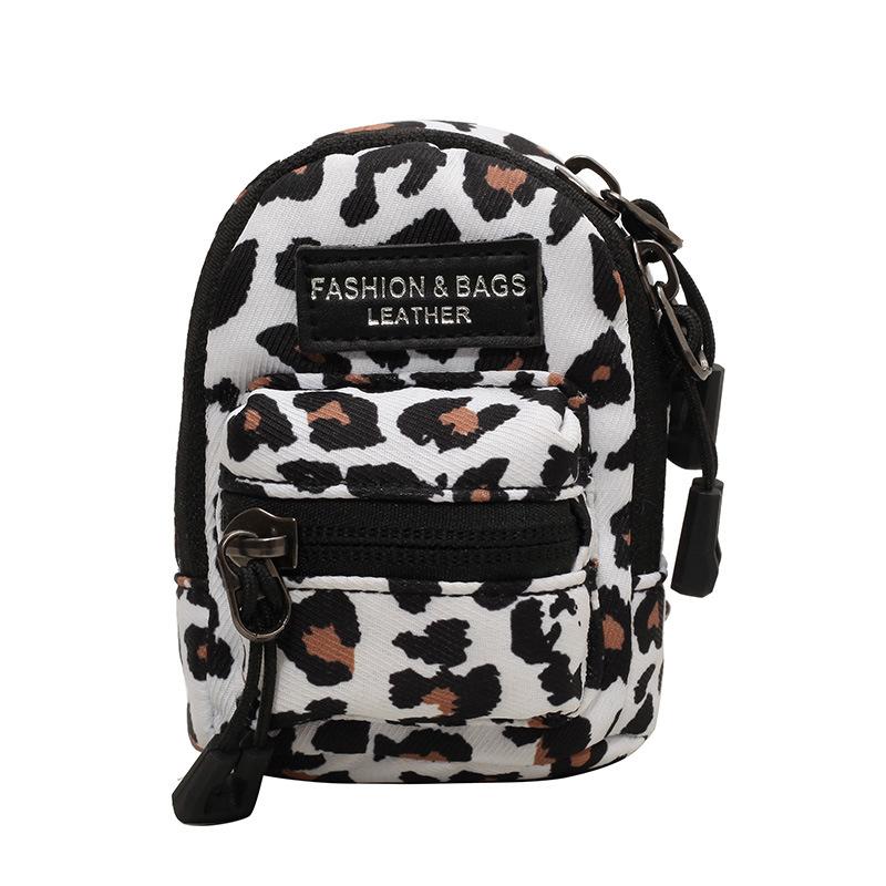 Heart Shaped Faux Fur Cow Print Backpack  |  Bags & Backpacks Accessories Bags & Backpacks